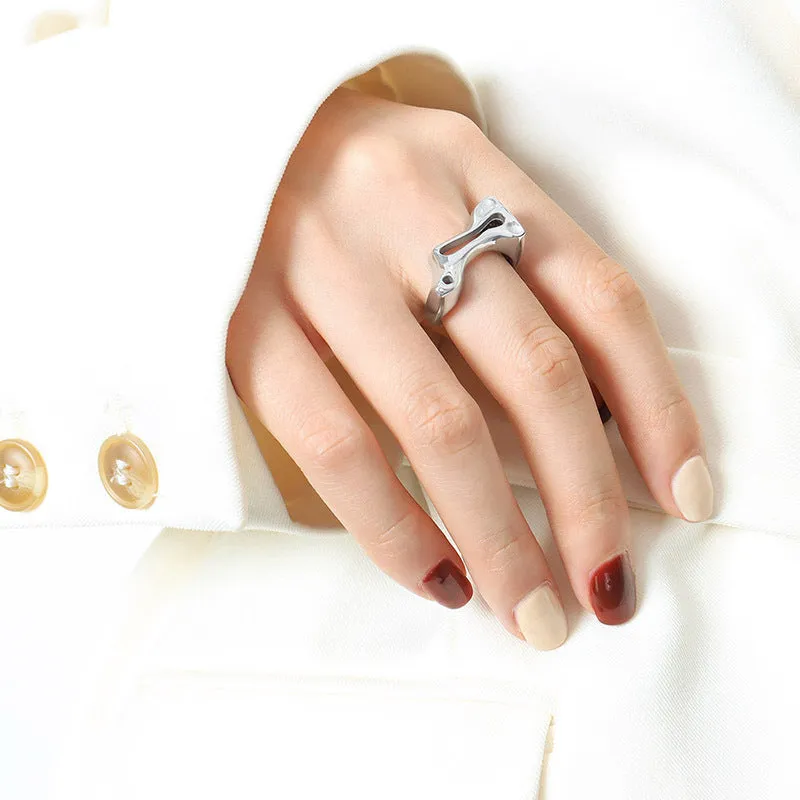 Luxurious Titanium Steel Ring with Unique Hollow Design for Fashion-forward Women