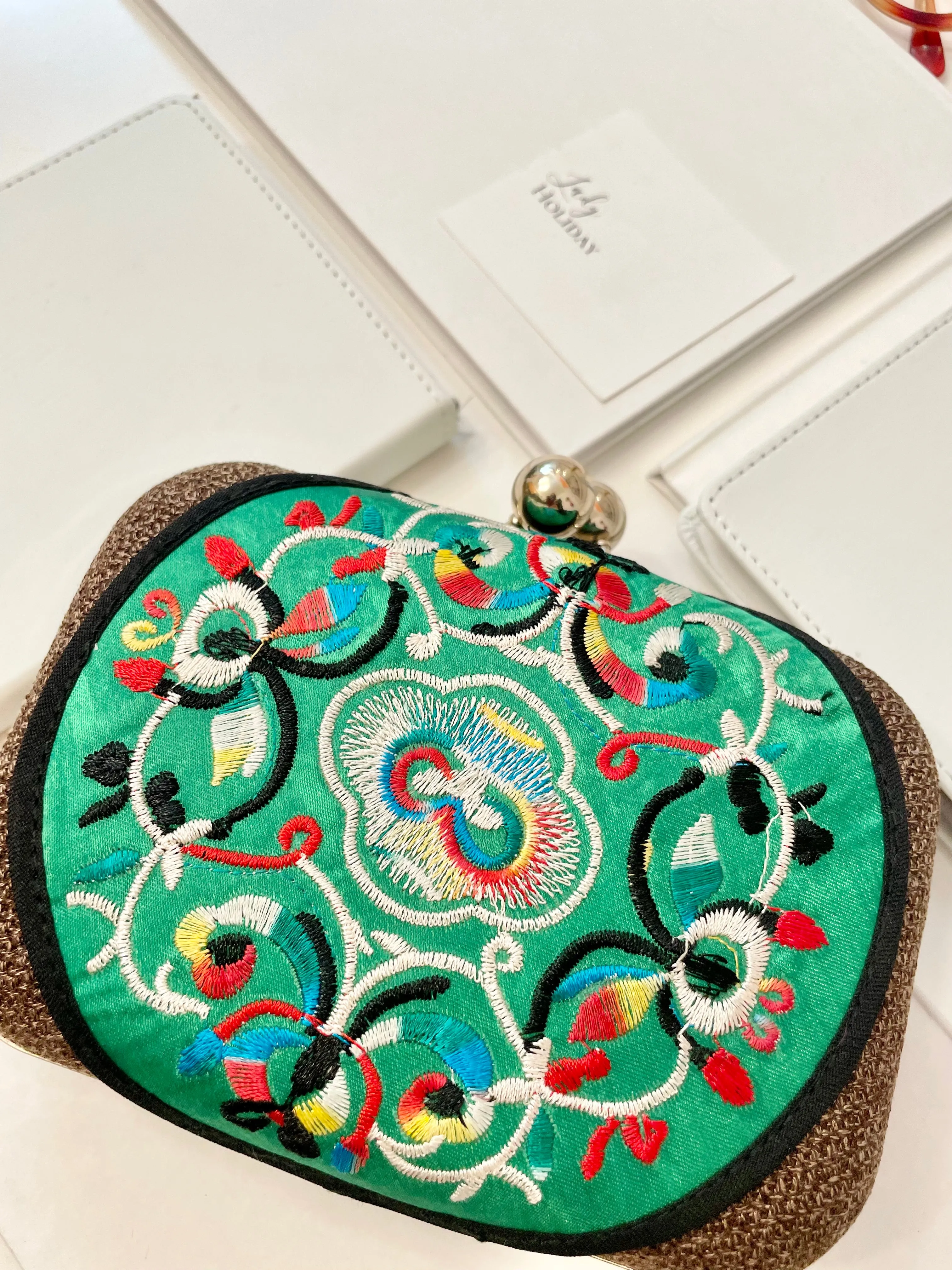 The Happy Hostess loves anything colorful.. this petite clutch bag is colorful, and super chic!