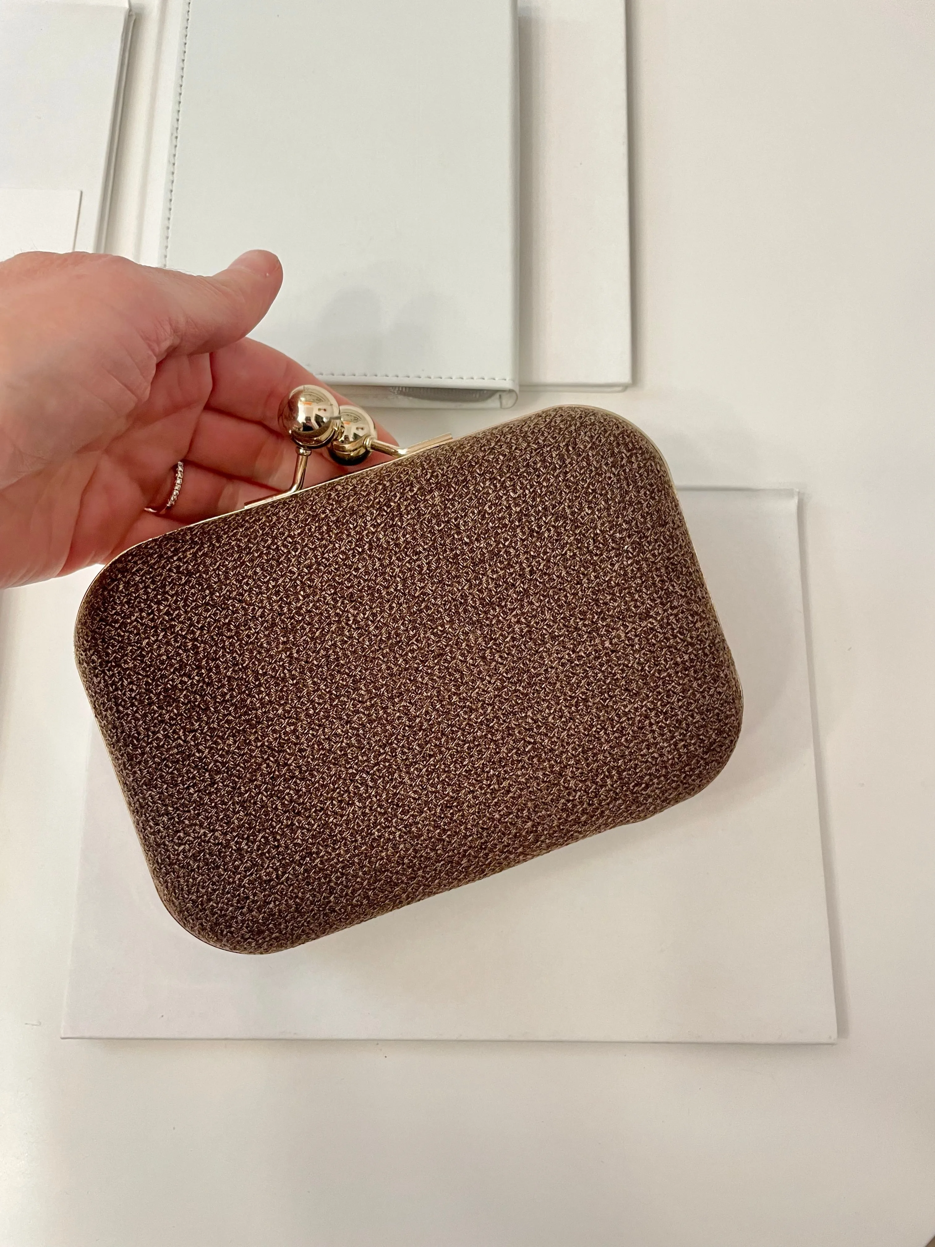The Happy Hostess loves anything colorful.. this petite clutch bag is colorful, and super chic!