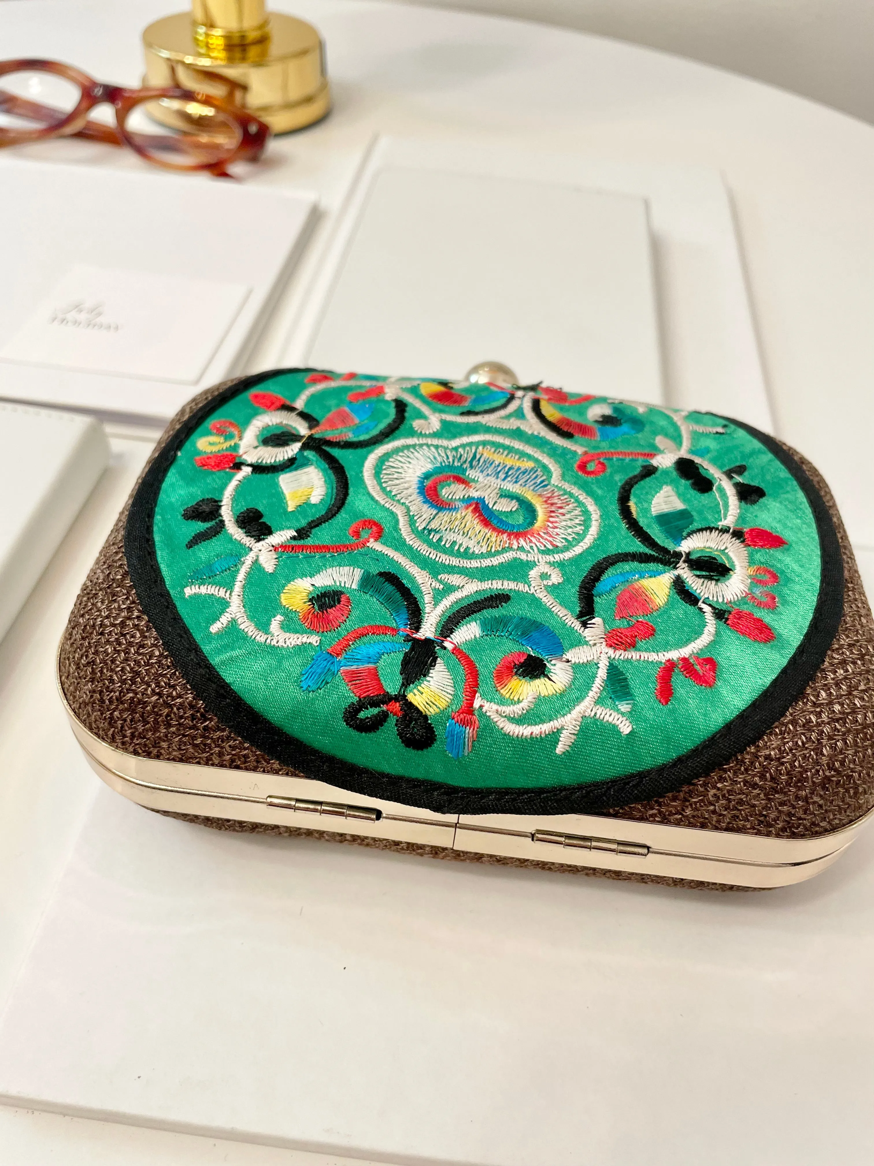 The Happy Hostess loves anything colorful.. this petite clutch bag is colorful, and super chic!