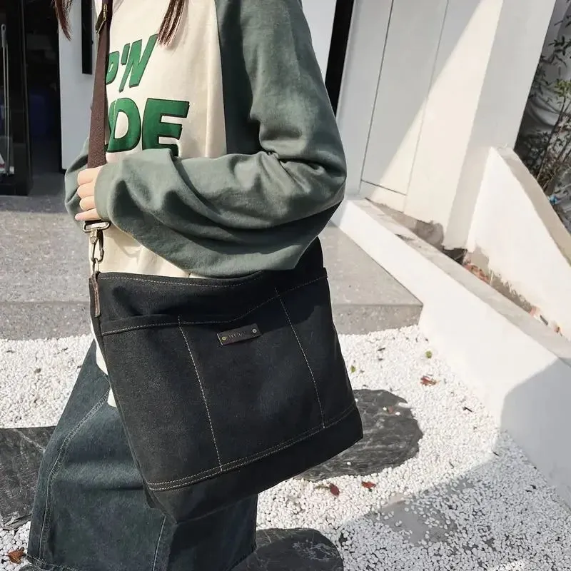 UAKISS  -  2024 Vintage Streetwear Men Canvas Messenger Bag Casual Men Satchel Bag Travel Shoulder Bag Crossbody Bags Bookbag