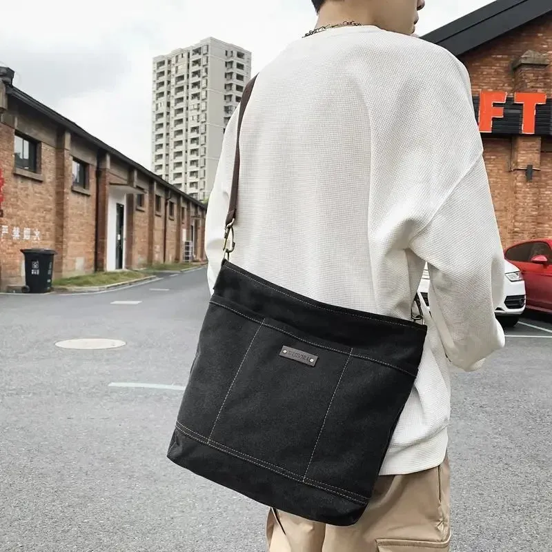 UAKISS  -  2024 Vintage Streetwear Men Canvas Messenger Bag Casual Men Satchel Bag Travel Shoulder Bag Crossbody Bags Bookbag